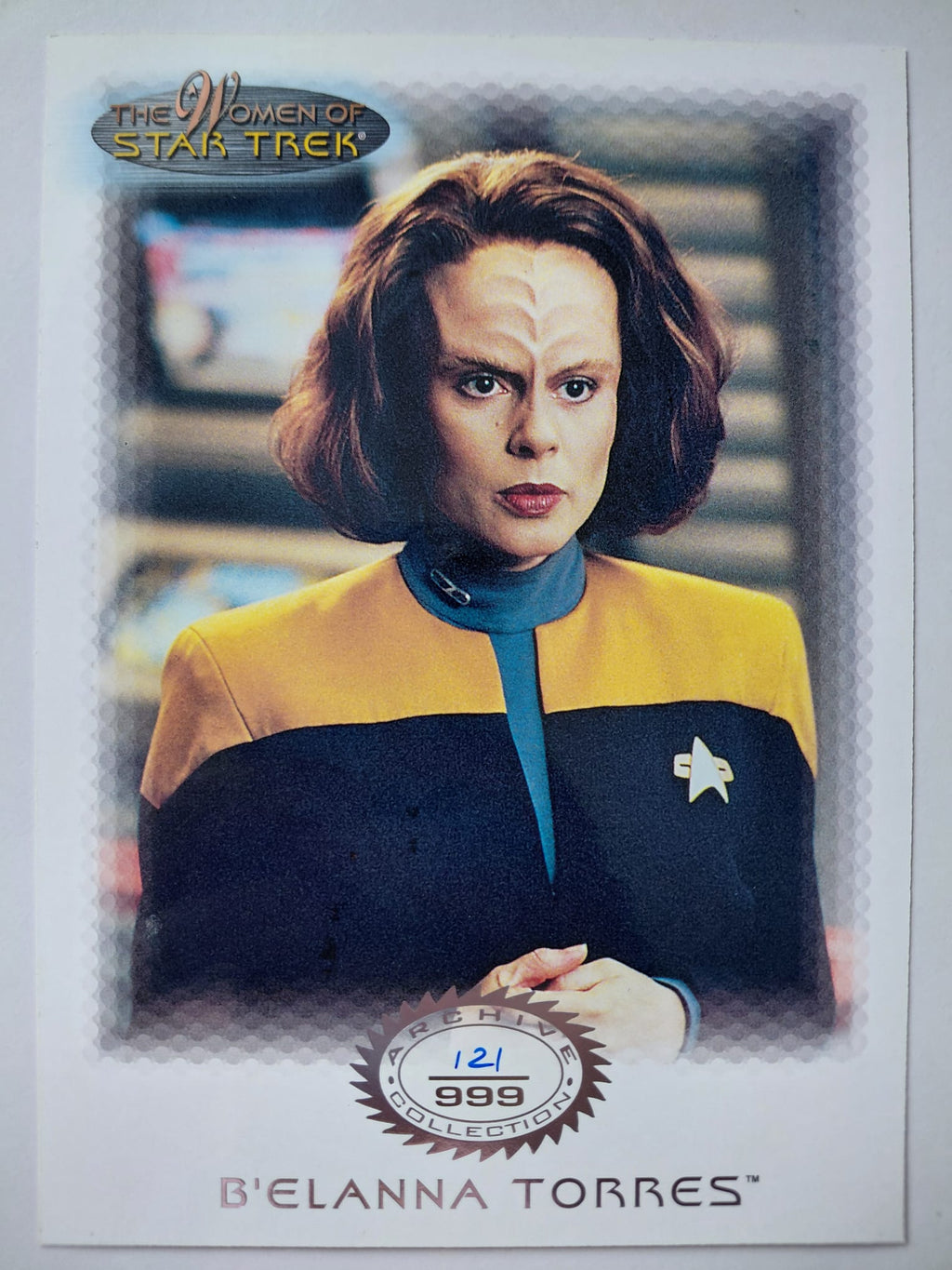 Trading card featuring B'Elanna Torres from Star Trek, with a starship interior background.