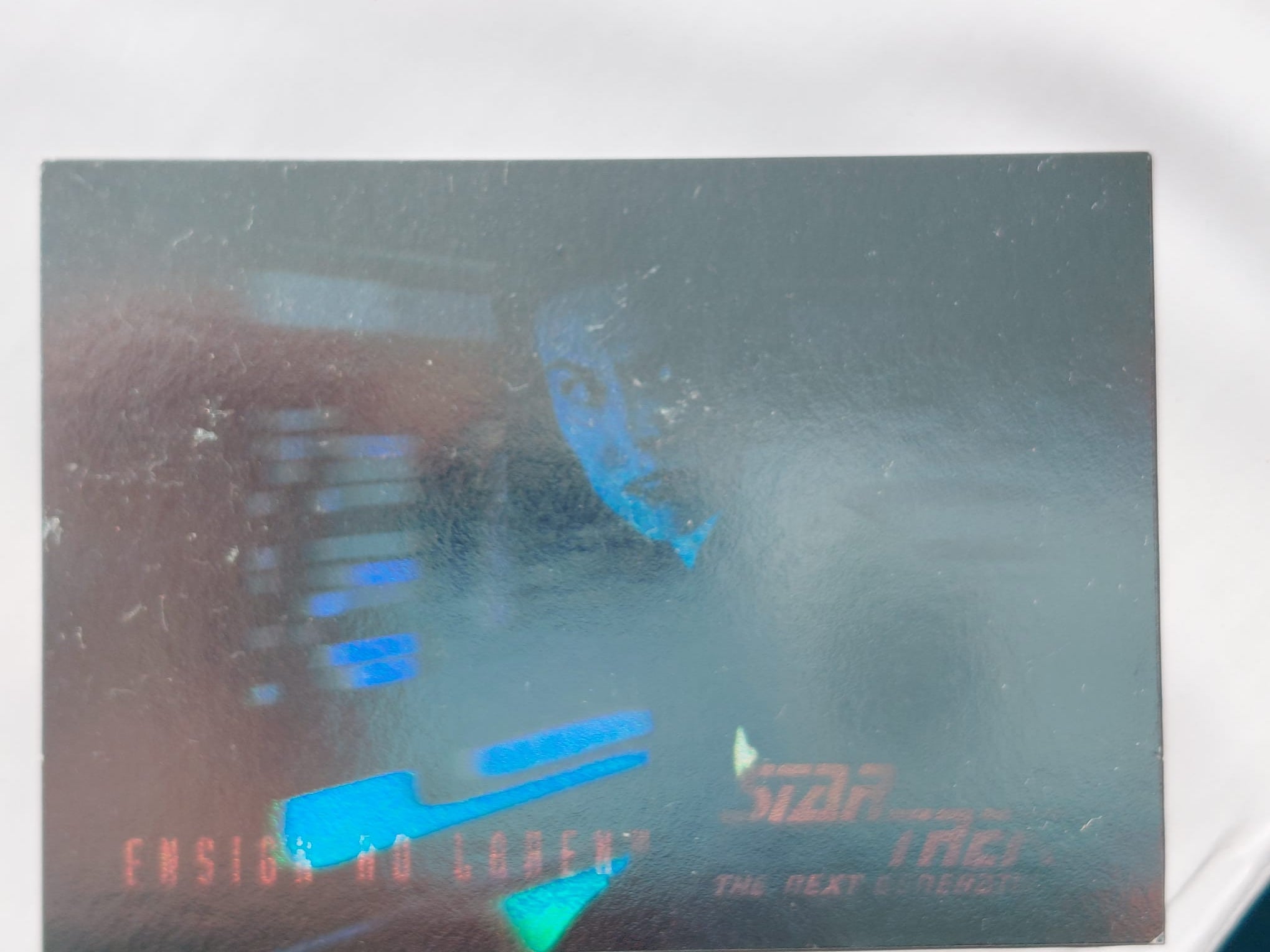 damaged holographic