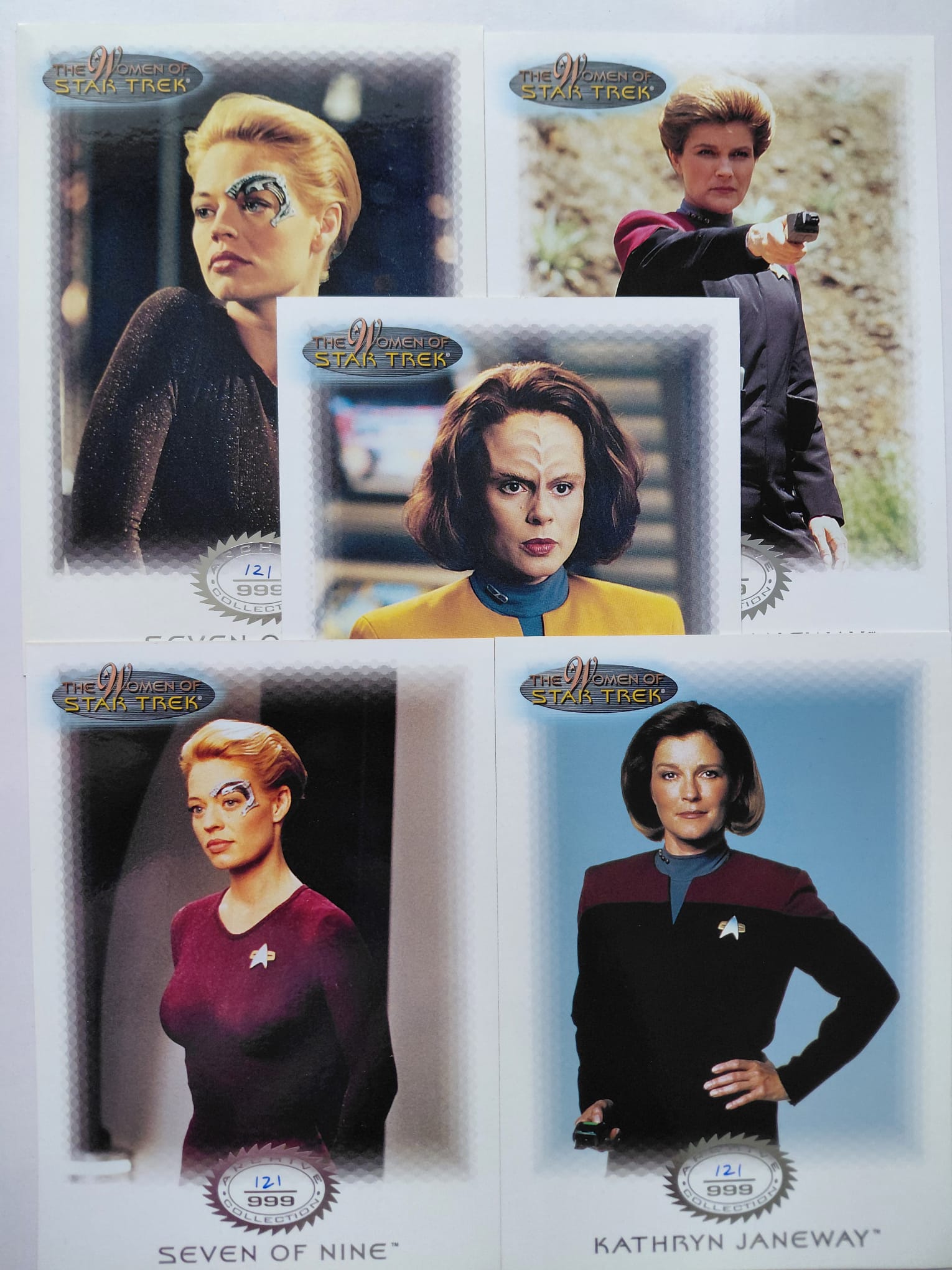 Collection of trading cards featuring characters from 'Star Trek' with 'Seven of Nine' and 'Kathryn Janeway'.